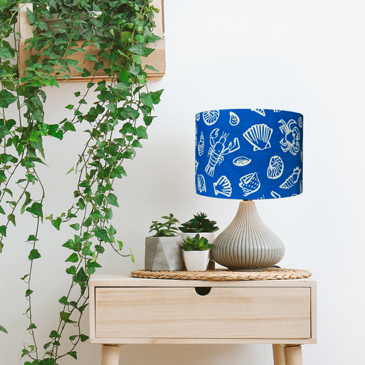 Shells on blue lampshade image 1
